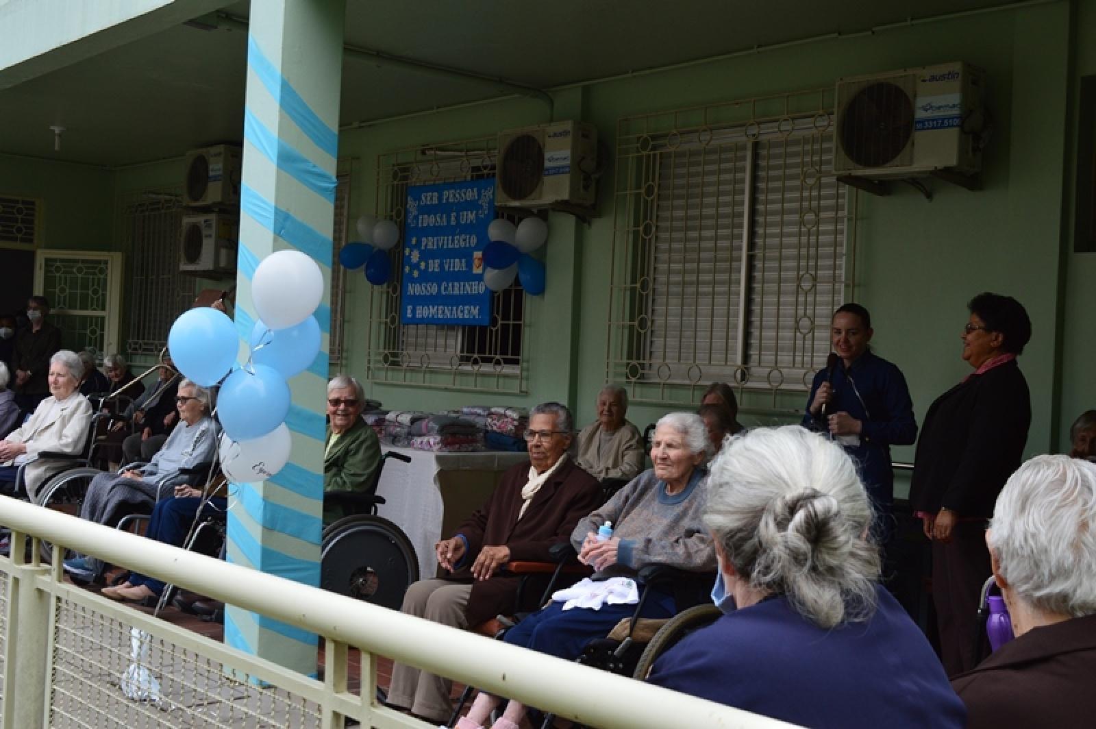 Celebração e banda Marcial de Música na Casa São José