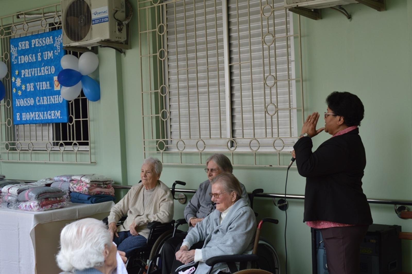 Celebração e banda Marcial de Música na Casa São José